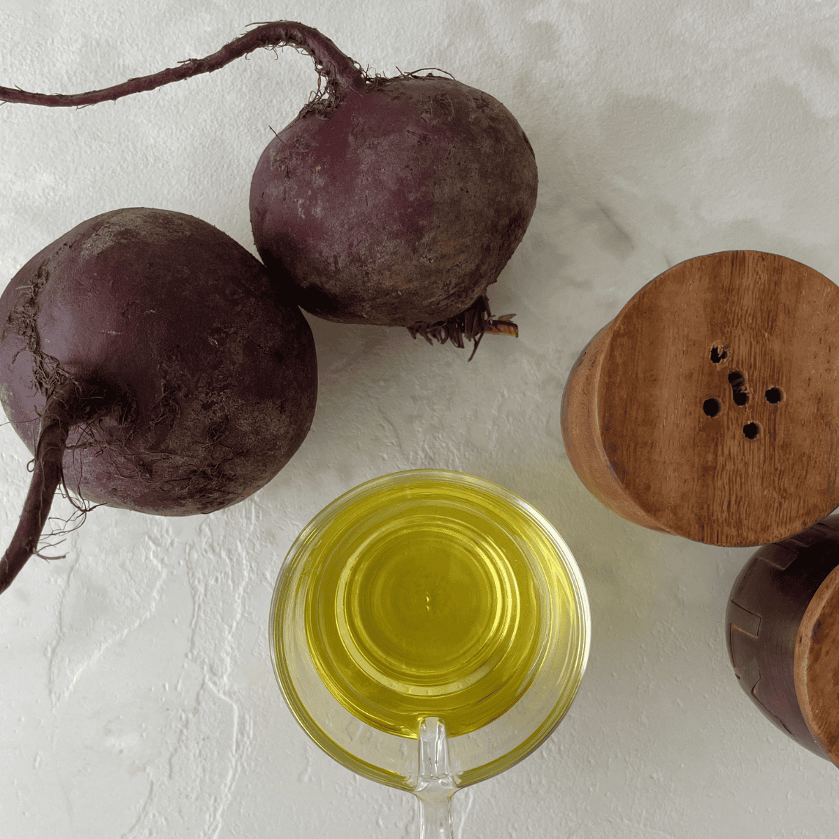 Ingredients needed for Air Fryer Beet Chips on kitchen table.