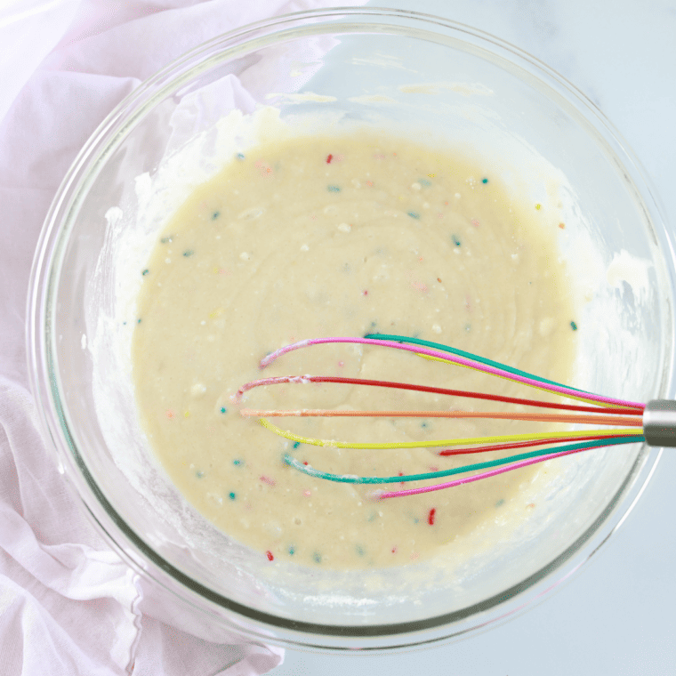 Prep the Donut Batter:

In a large mixing bowl, combine the cake mix, eggs, vegetable oil, and water (add vanilla extract if using). Mix until you have a smooth batter with no lumps.