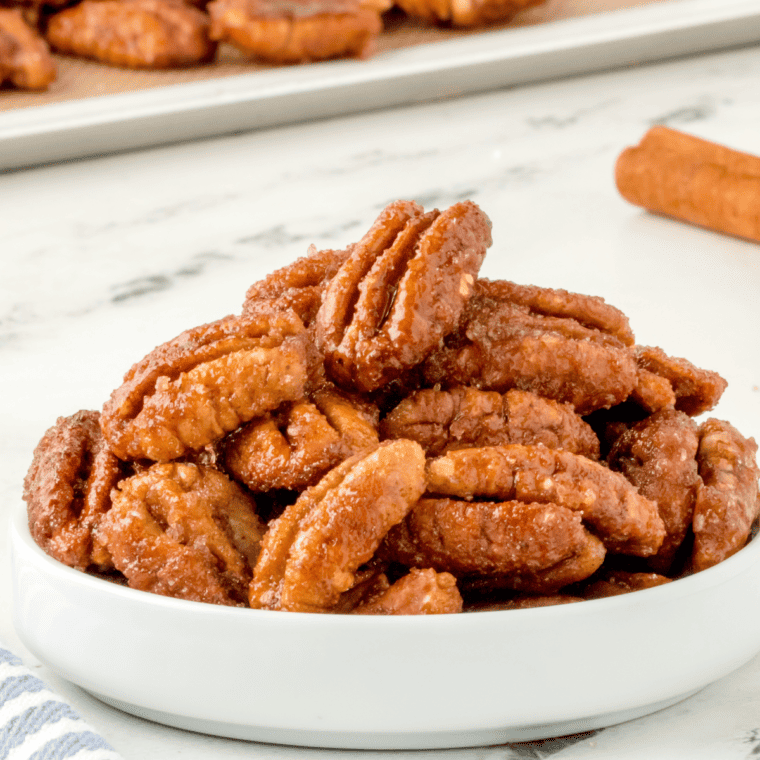 side view closeup: a small bowl of air fryer candy pecans