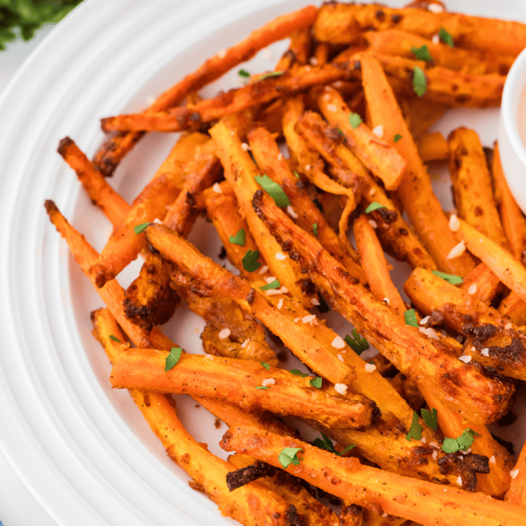 Golden and crispy Air Fryer Carrot Fries ready to serve as a healthy side dish.