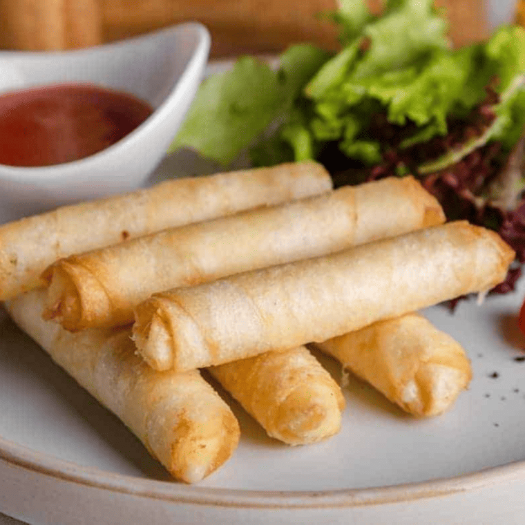 Air Fryer Frozen Spring Rolls -- If you have been looking for a better way to cook your Frozen Spring Rolls, look no further than your air fryer! In less than 10 minutes, you will have a batch of crispy spring rolls, perfect for a quick snack or tasty appetizer