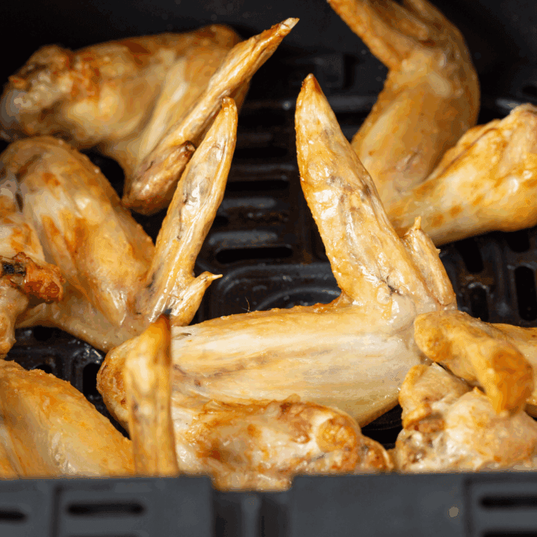 Cooked Hooters Buffalo Chicken Wing Recipe in the air fryer basket.