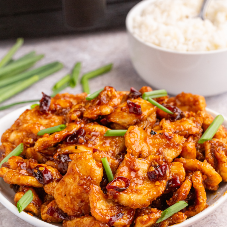 Air Fryer Mongolian Chicken: Crispy, tender chicken pieces coated in a flavorful sauce with garlic, ginger, and a touch of heat.