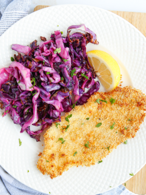 Finished Air Fryer Red Cabbage on a plate with garnish