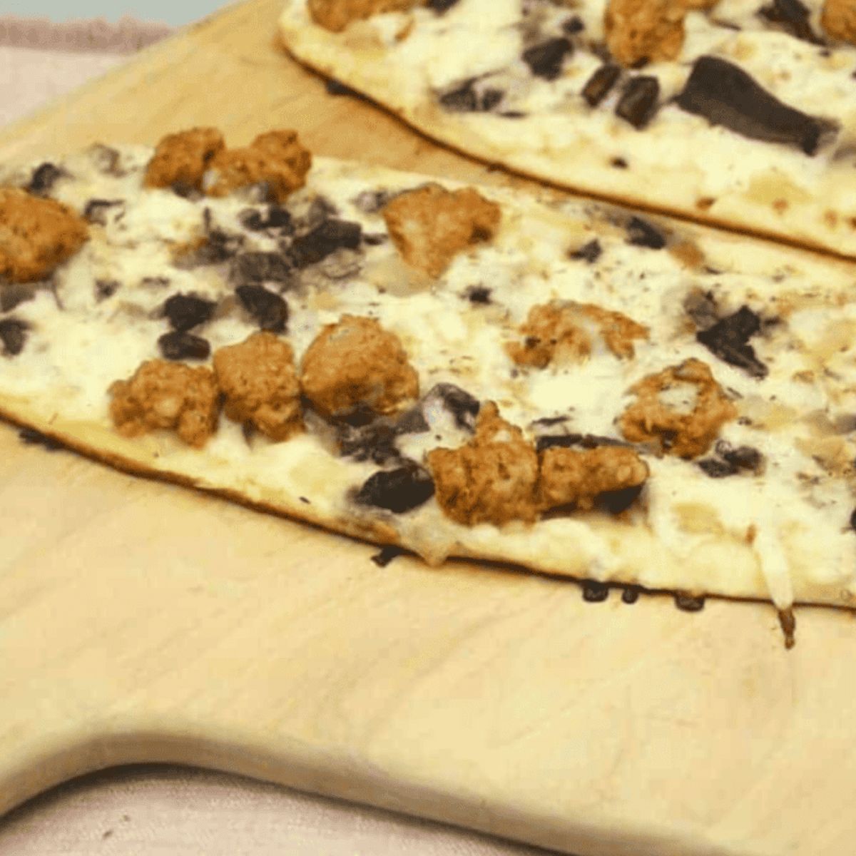 Blackstone Griddle Sausage & Mushroom Flatbread Pizza