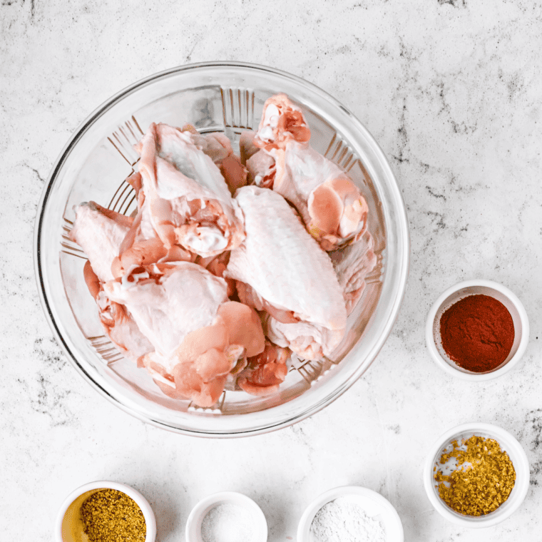 Ingredients needed for Copycat Wingstop Hawaiian Sauce Chicken Wings Recipe on kitchen table.