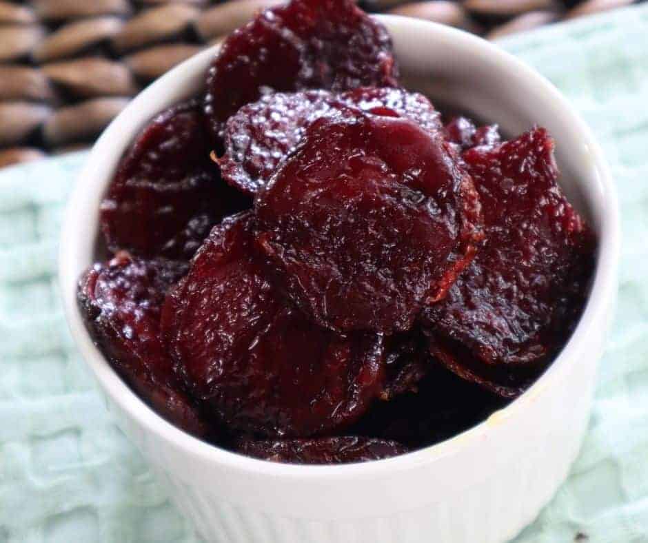 overhead closeup: beet chips made in air fryer in a small bowl