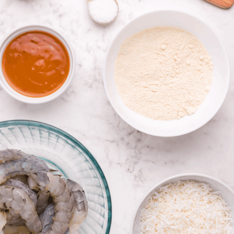 Ingredients needed for Outback Coconut Shrimp on kitchen table.