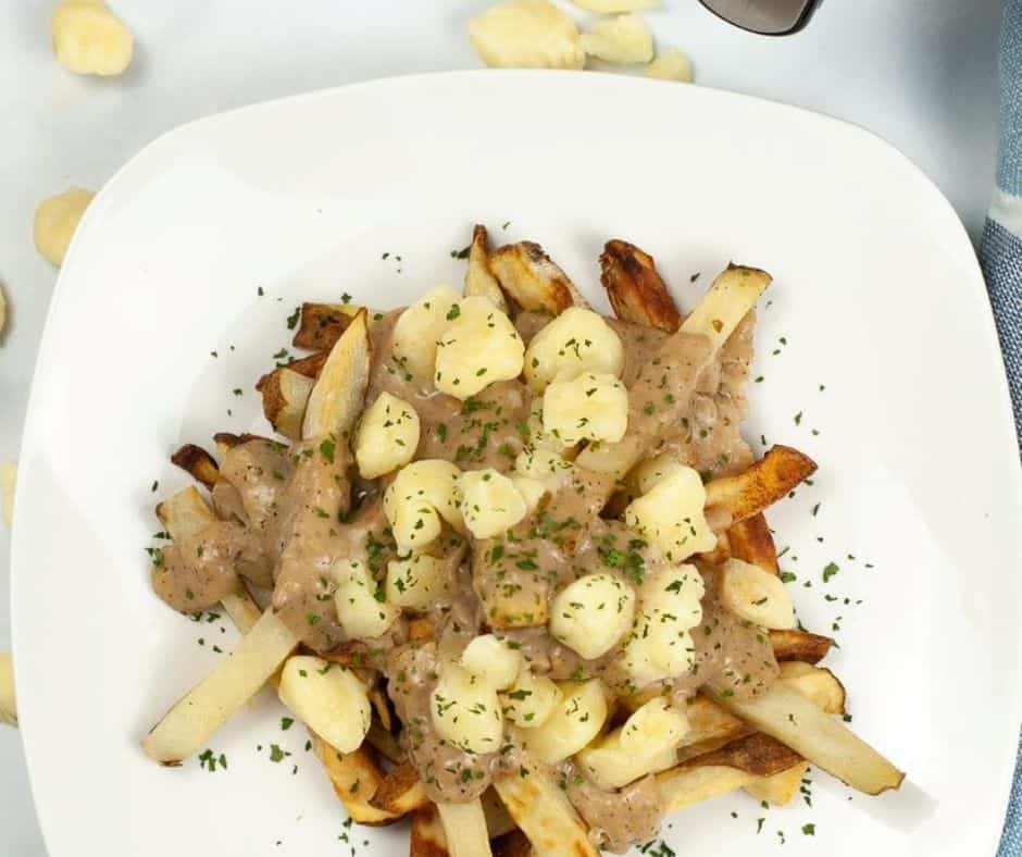 If you’re a fan of crunchy, tasty and delicious fries, then you should give air fryer poutine french fries a try. Whether you are an experienced home cook or just starting your culinary journey, cooking up a plate of these scrumptious treats is surprisingly easy. Air fryers have revolutionized the way we cook food – now it's easier than ever to create crispy french fries in almost no time! In this blog post, I'll show you how to make perfect poutine french fries with your air fryer. You'll learn all the essential tips and tricks to get well-cooked potatoes that will satisfy even the most discerning palate!