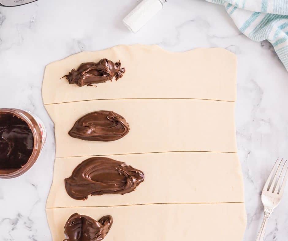If you love the convenience of an air fryer but also crave a homemade treat, then this recipe for making Nutella Pop-Tarts in an air fryer is perfect for you! Not only does this simple yet delicious dish provide the ease and savings associated with an air fryer, it also has all of those childhood memories and delights that come with biting into a freshly made pop-tart. This quick snack can be made from basic baking ingredients and is ready to serve in under fifteen minutes; breaking down any excuses for not treating yourself to something special at home.