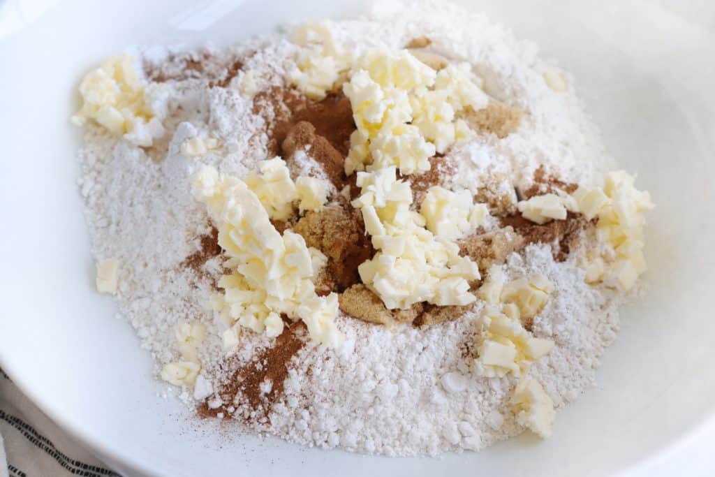 Bowl with ingredients and grated butter on top