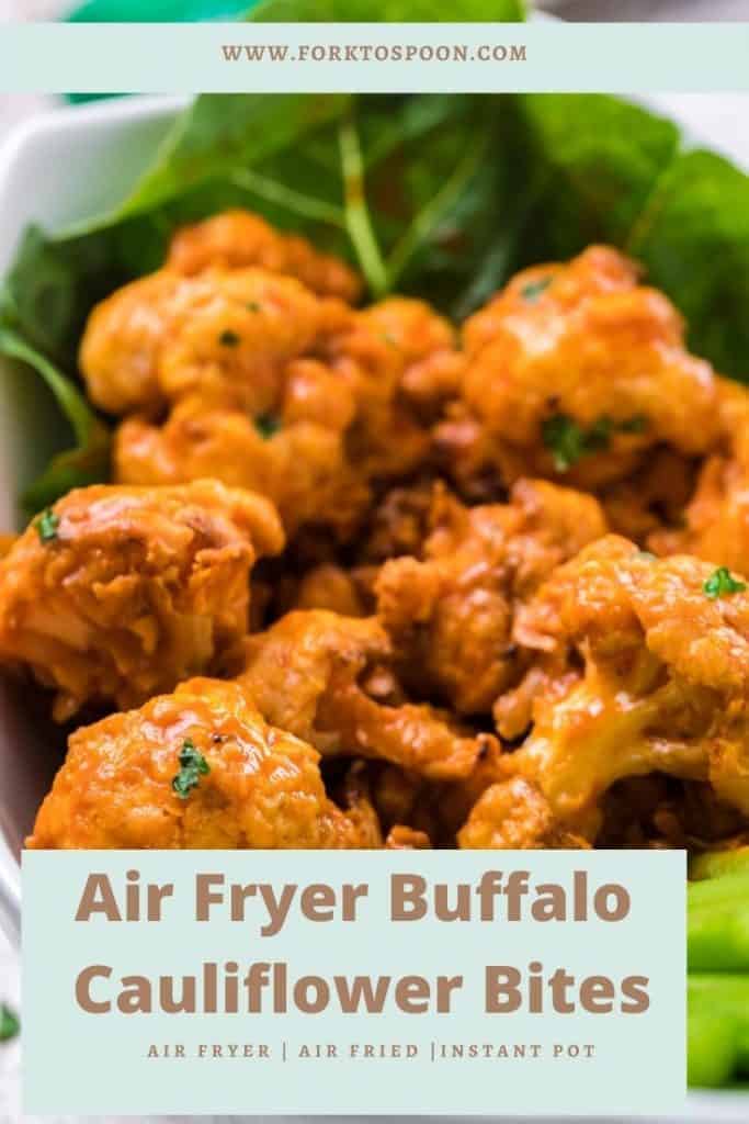 Pin for this recipe.
The image is a close up view of the crispy cauliflower bites, they look orange from being covered in sauce, there is some salad leave underneath.
In the text box it reads 'Air Fryer Buffalo Cauliflower Bites. Air fryer, Air fried, Instant Pot.