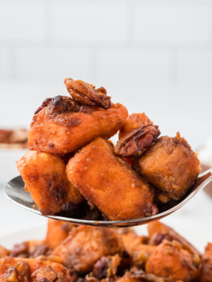 "Perfectly caramelized air fryer canned sweet potatoes in a white bowl."