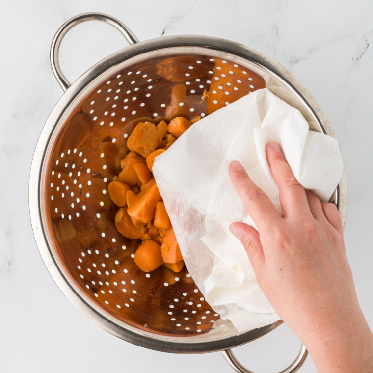 Dry the canned sweet potatoes, for them to crisp up.