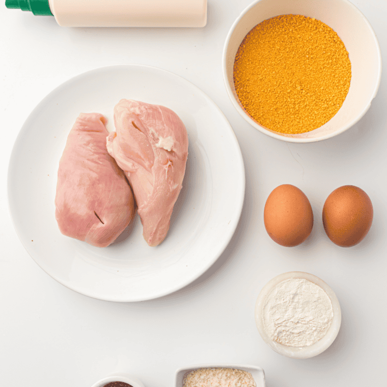 Ingredients needed for Air Fryer Chicken Cutlets on kitchen table.