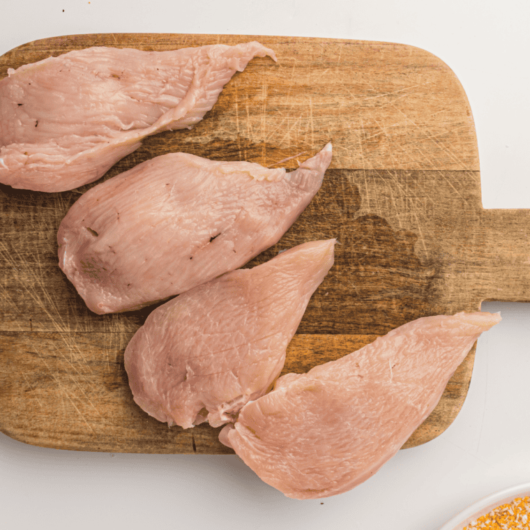 Slice chicken breasts horizontally into 4 thinner cutlets.