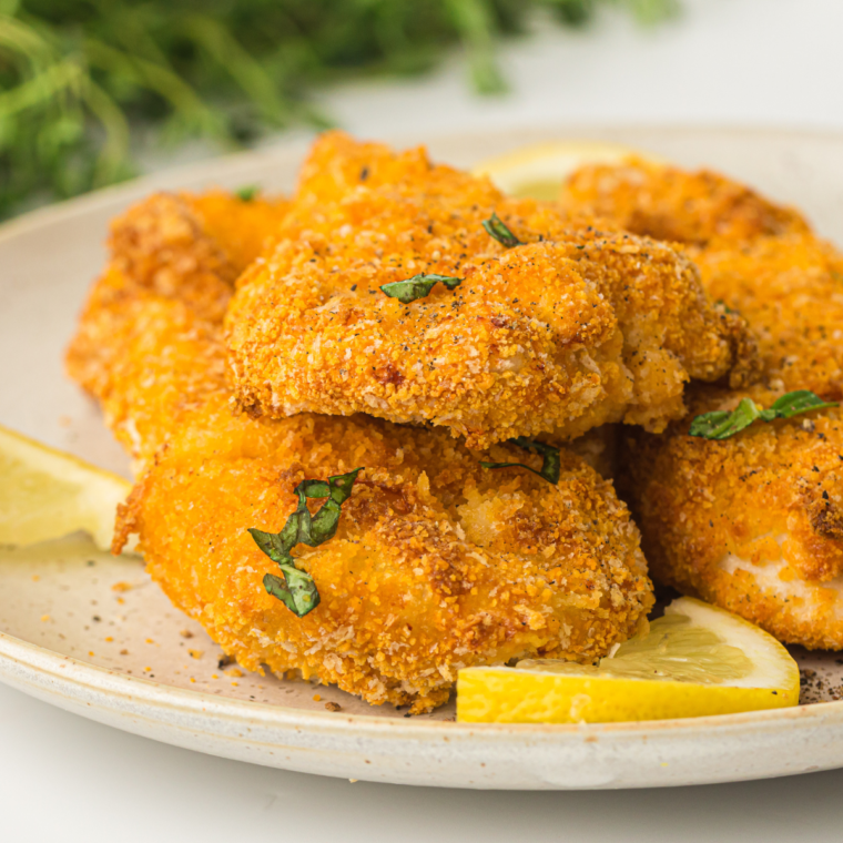 Golden and crispy Air Fryer Chicken Cutlets served on a plate.