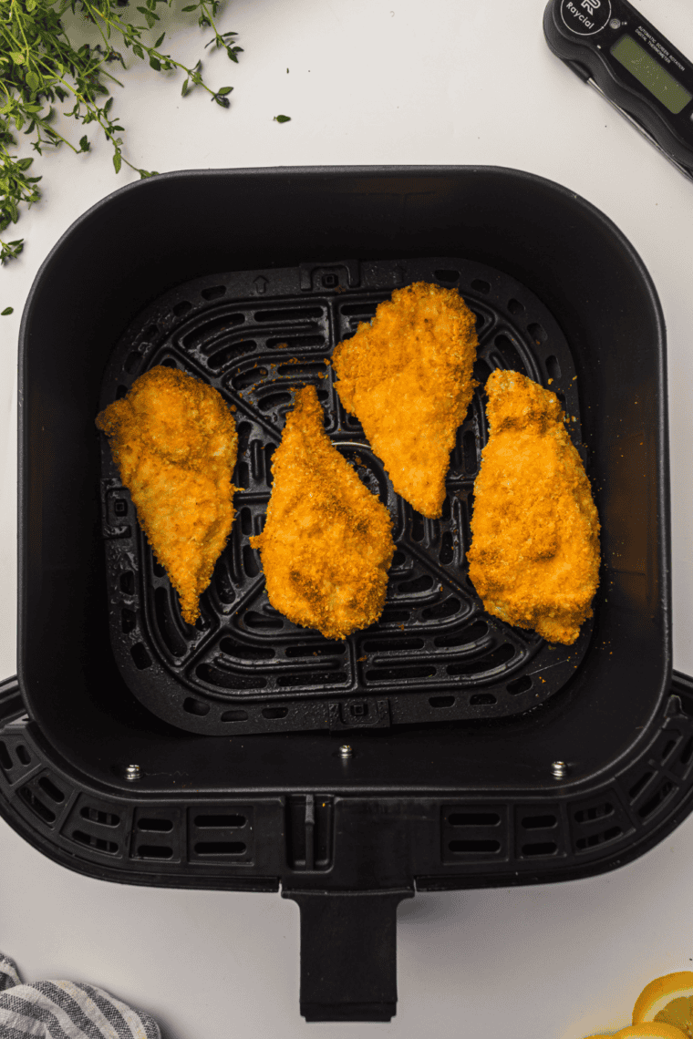 Golden, crispy Air Fryer Chicken Cutlets served on a plate.