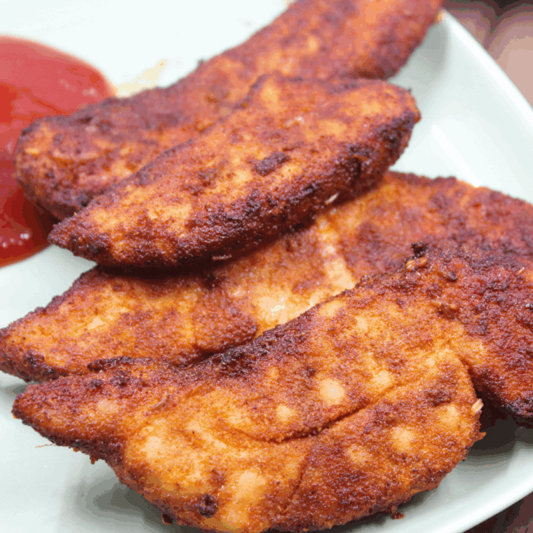 Air Fryer Chicken Tenders without breading, crispy on the outside and juicy inside.