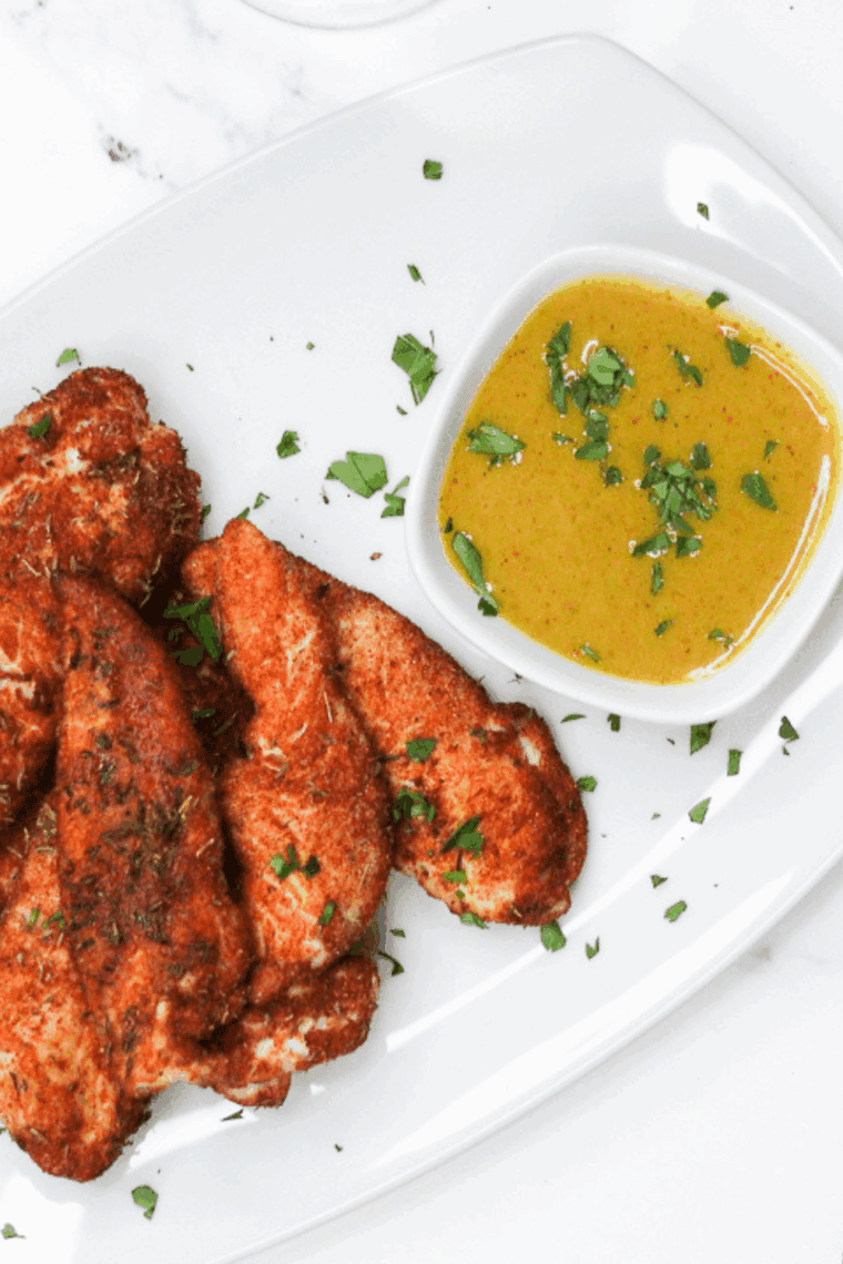 Air Fryer Chicken Tenders without breading, crispy on the outside and juicy inside.