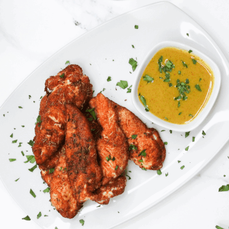 Air Fryer Chicken Tenders without breading, crispy and juicy inside.