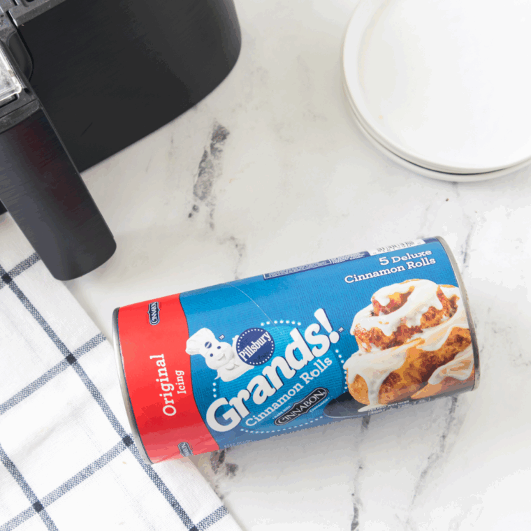 Ingredients needed for Easy Air Fryer Cinnamon Roll Bites on kitchen table.