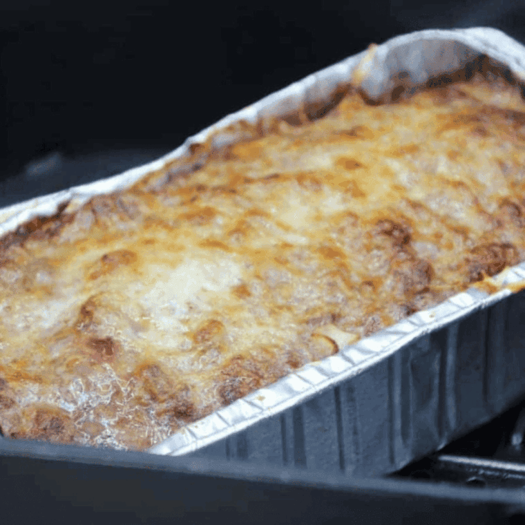 Sliced Italian-style meatloaf cooked in the air fryer with a crispy golden crust.