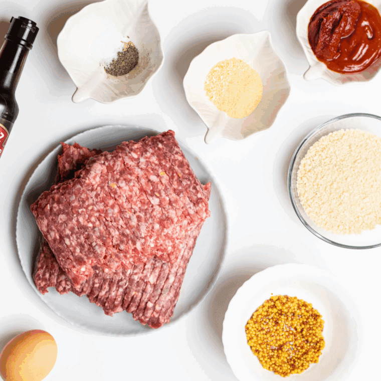 Ingredients needed for Air Fryer Italian Meatloaf on kitchen table.