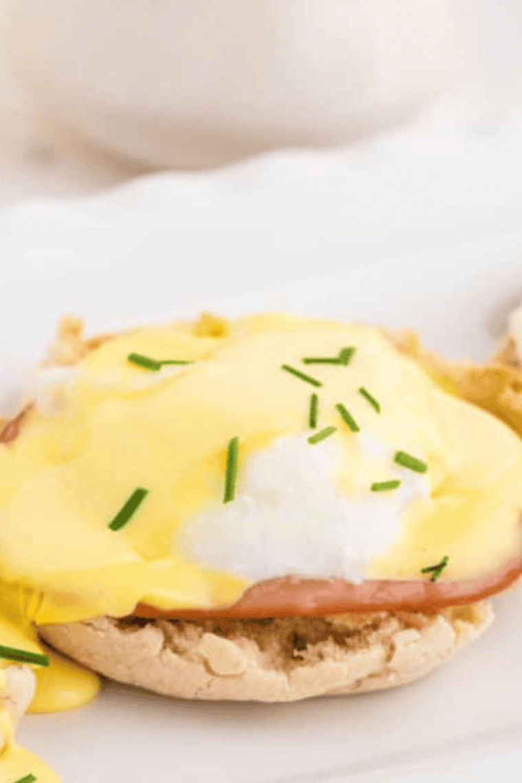 Air fryer poached eggs made in ramekins with water using gentle steam method producing soft set whites and runny yolks in 6 minutes without vinegar or swirling technique for consistent results