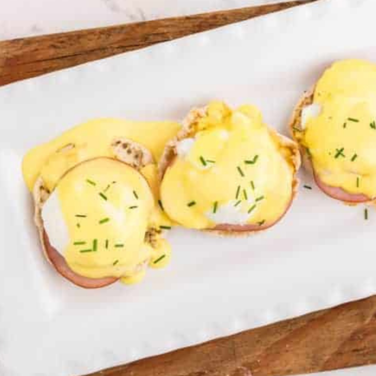 Air fryer poached eggs made in ramekins with water cooking to set whites and runny yolks in just 6 minutes without vinegar or swirling method