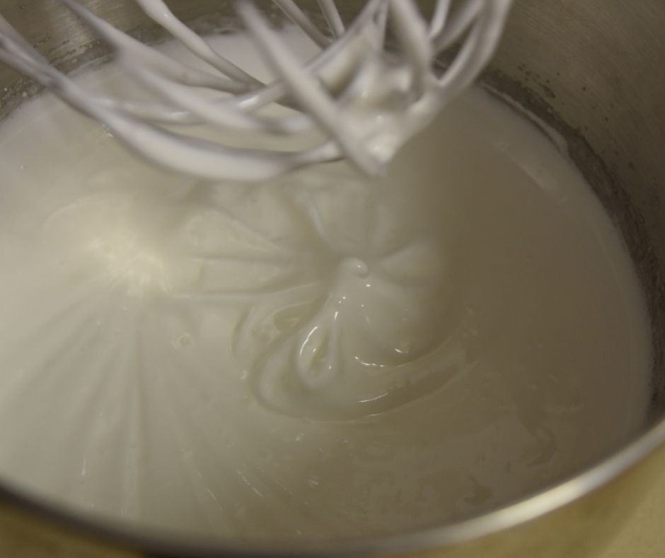 Start mixing the flour, sugar, baking powder, and salt in a large mixing bowl. Then mix in the milk. Add the egg and vanilla.