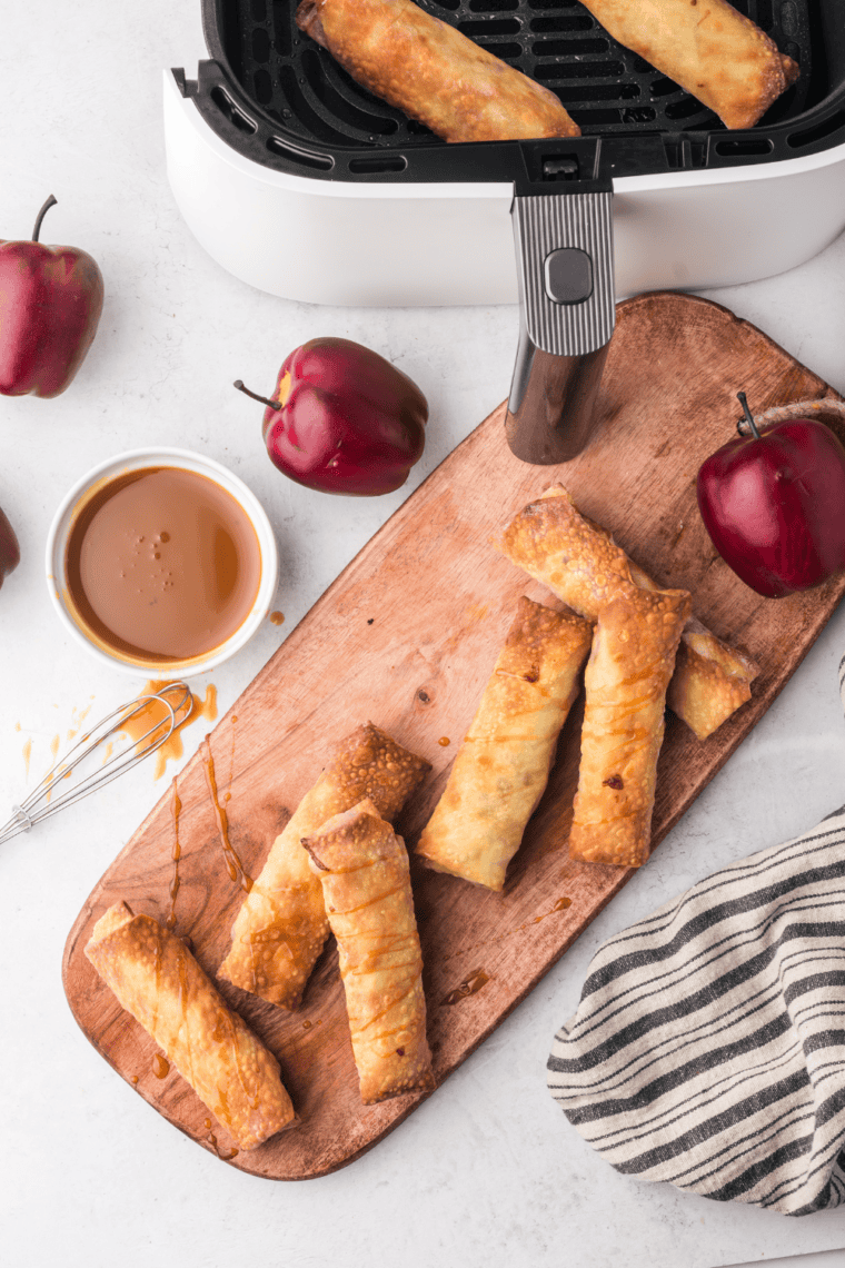 Air Fryer Apple Pie Egg Rolls with golden crispy exterior and warm apple filling.