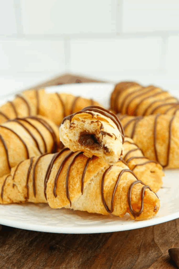 Freshly baked Arby’s-style chocolate turnovers with golden, flaky crust and melted chocolate filling.