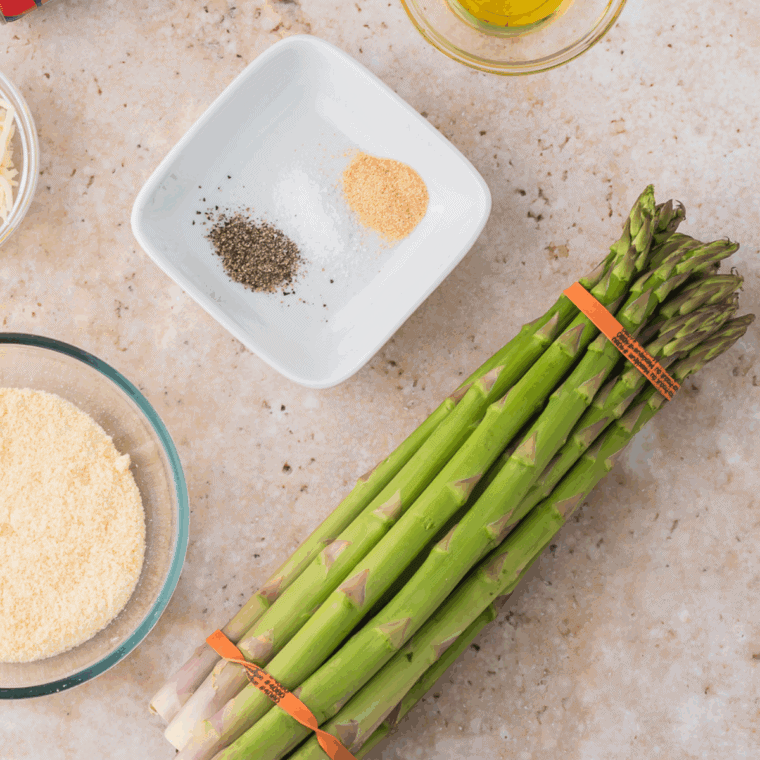 Ingredients needed for Blackstone Griddle Asparagus on kitchen table.