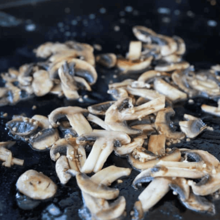 Cooking mushrooms on the Blackstone Griddle.