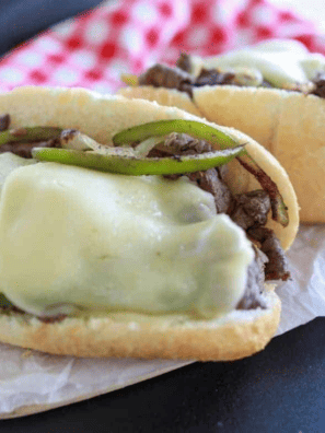 Blackstone Griddle Philly Cheesesteak -- If you have been looking for an authentic Philly cheesesteak recipe, this is the Blackstone recipe for you; prepared with the best meat and smothered with provolone cheese, this makes for the perfect meal!