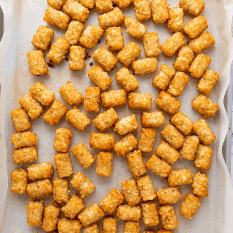 Bowl of melted butter mixed with buffalo sauce and garlic powder.