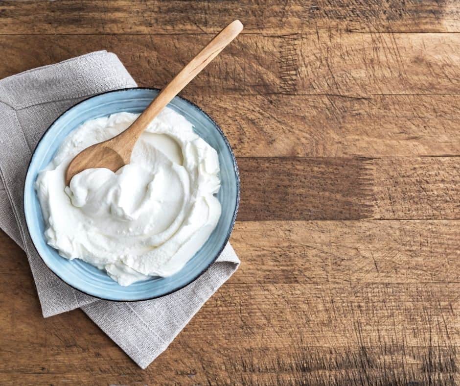 Greek Yogurt In Bowl On Table