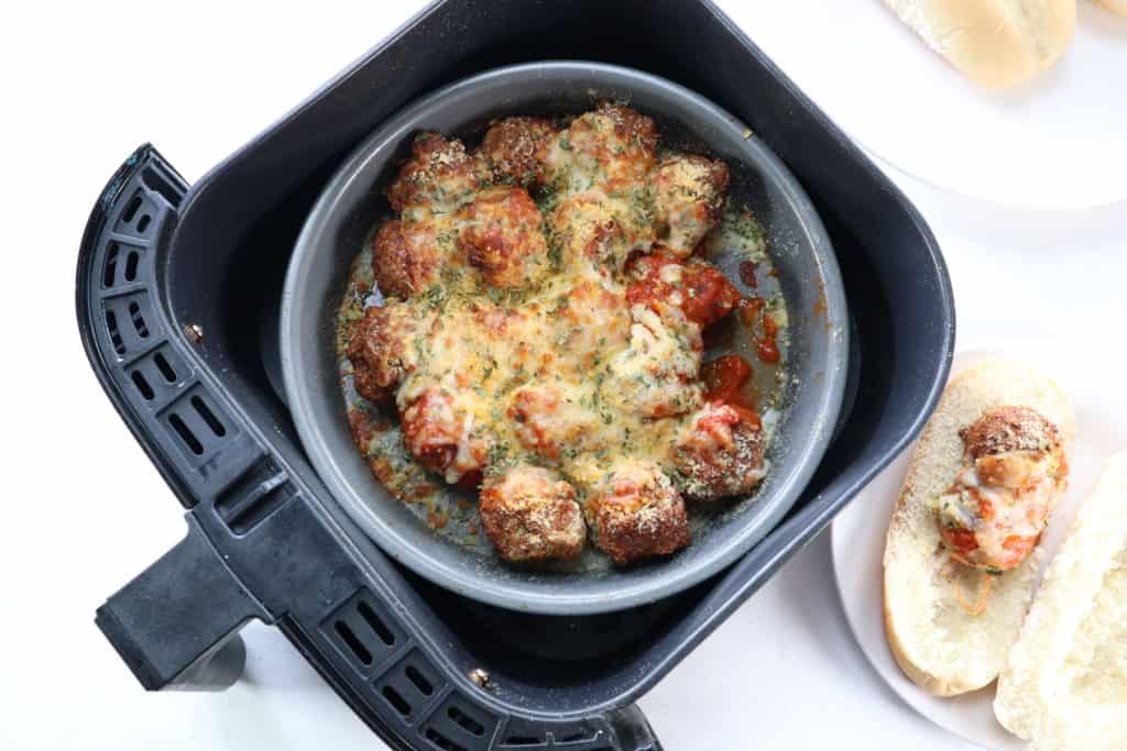 Air Fryer Chicken Parmesan Meatballs done with cheese on top. 