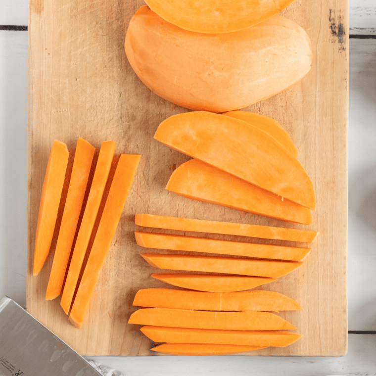 Peeled sweet potatoes cut into thick steak fries for perfect texture.