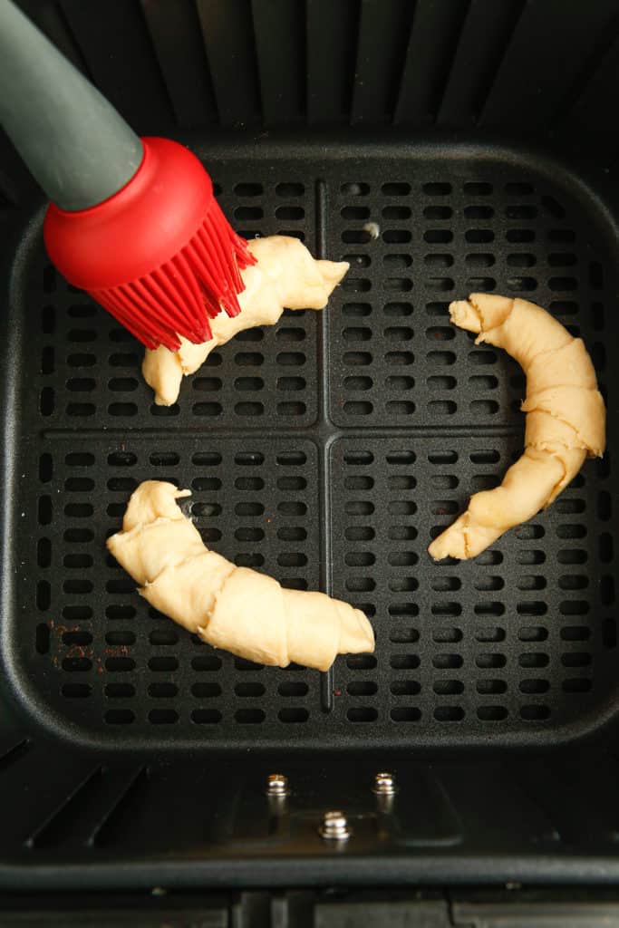 Brush Croissants With Melted Butter- In air fryer basket