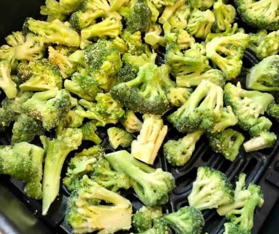 Set cook time for 10-12 minutes, shaking the basket halfway through the cooking time to ensure even cooking.

When the broccoli is cooked to your desired level of crispiness,  remove it from the air fryer and serve immediately.