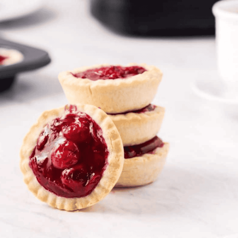 Golden, flaky Air Fryer Cherry Tarts filled with sweet cherry filling, perfect for a quick dessert.