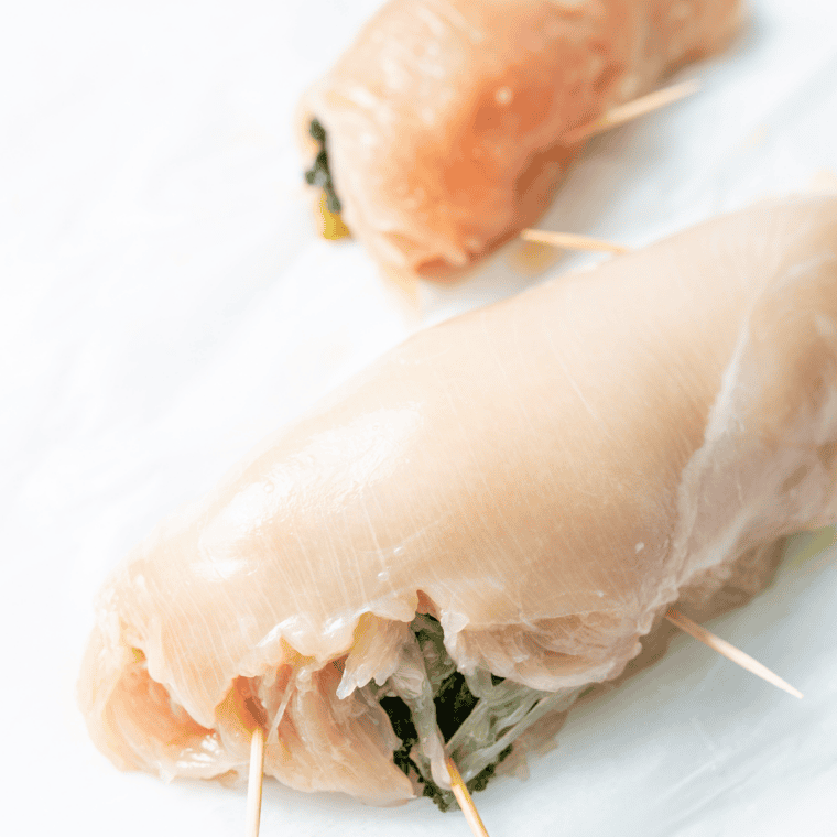 Air fryer basket preheated and sprayed with oil for crispy cooking surface