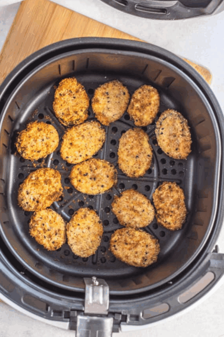 Place the Everything Bagel Zucchini Chips in the air fryer basket.