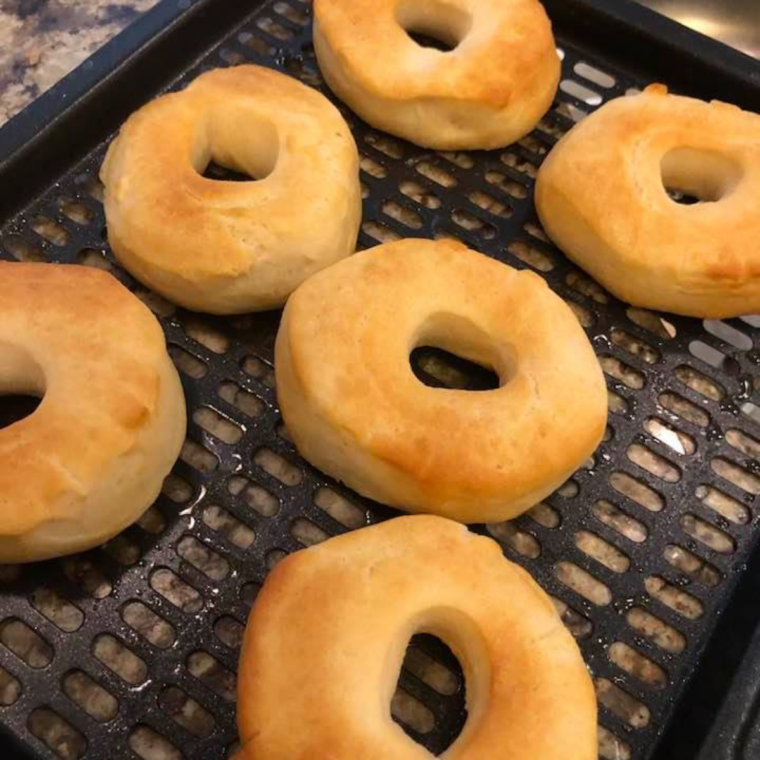 Remove when the biscuit donuts are golden brown.