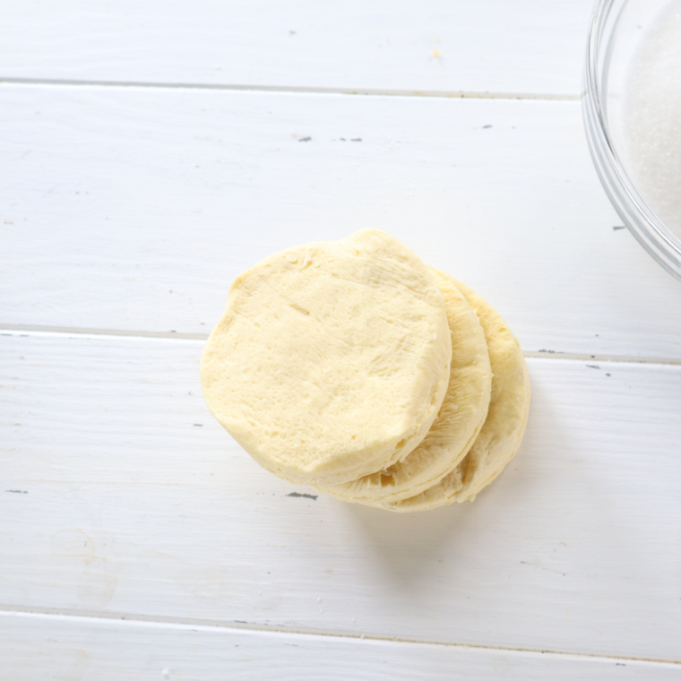 Ingredients needed for air fryer powdered sugar donuts.