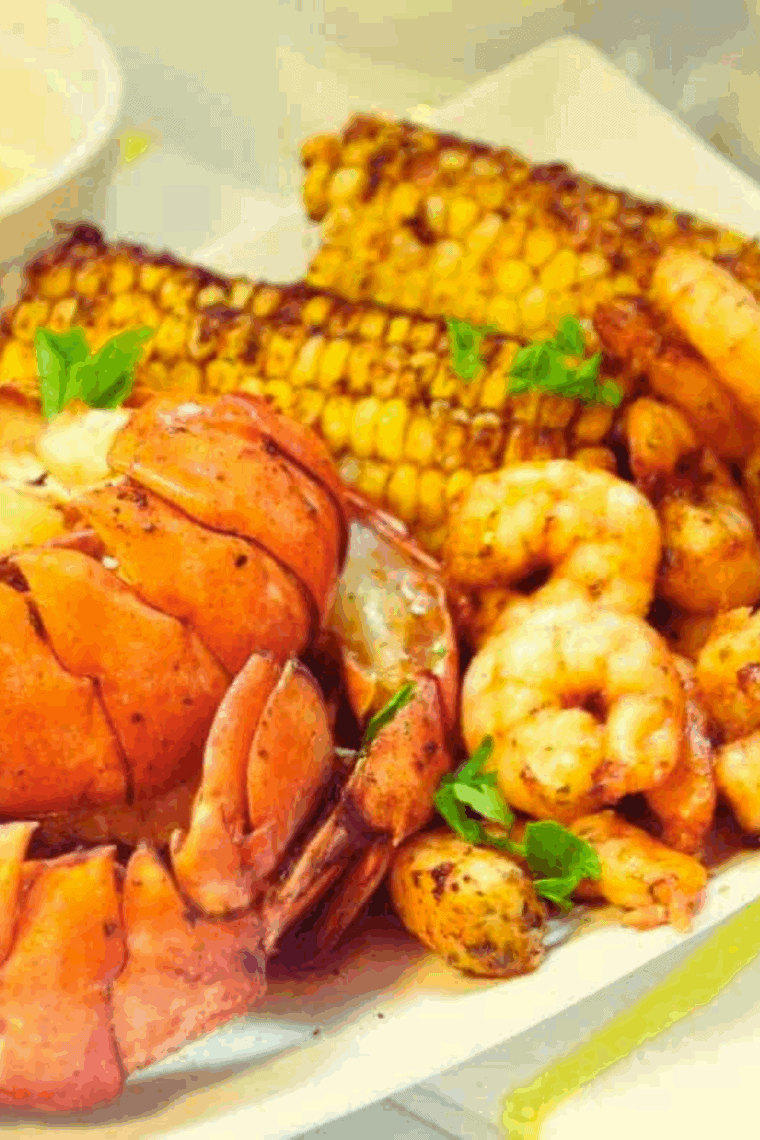Air Fryer Seafood Boil with shrimp, lobster, corn, and potatoes, all perfectly cooked and seasoned.