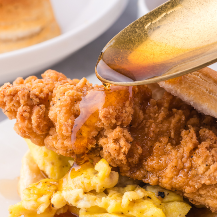 "Delicious crispy chicken strips served family-style with a variety of dipping sauces and sides, perfect for game day or weeknight dinners."