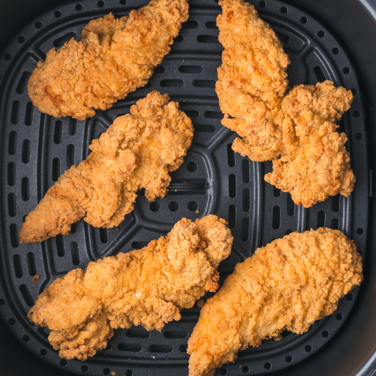 "Golden crispy Tyson chicken strips, ready to be enjoyed with fries and dipping sauces."